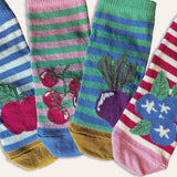 Close up of 4 baby socks with fruits on each including apples, blueberries, beetroot and tomatoes. The socks are striped, with a pop of colour