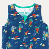 close up  of baby organic cotton romper with a zip down the front and a repeat print of a cycling and walking frog and hippo. The dungarees have a green zip guard at the chin to protect the baby.