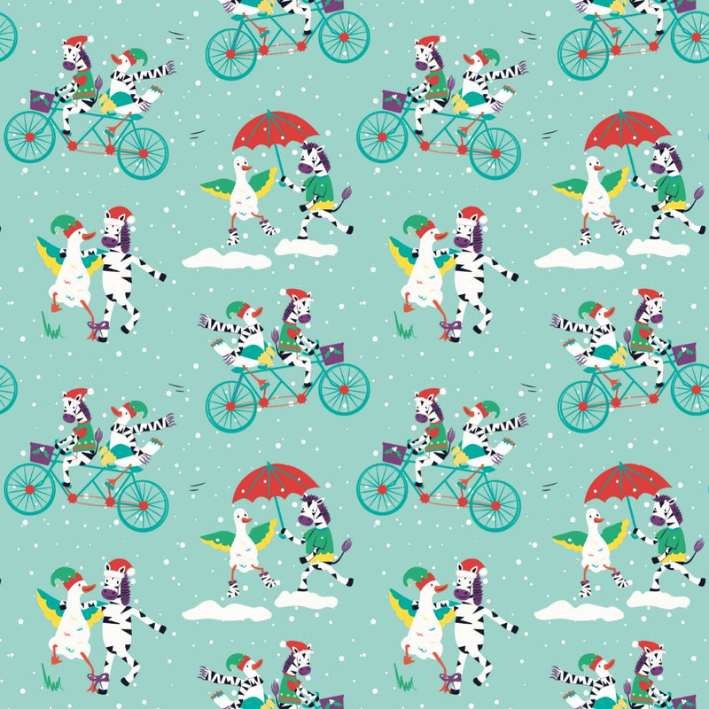 Close up image of Ducky Zebra wrapping paper, with a fun print of a Duck and Zebra cycling in the snow as they deliver presents and playing in the snow together.