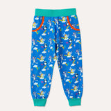 Bright blue joggers, with two deep pockets with an orange trim. Elasticated turquoise waistband and roll-up cuffs. Repeat print patter with a colourful elephant, zebra and puffin flying kites together.