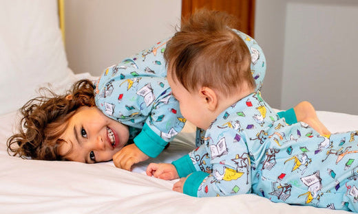 Children wearing Ducky Zebra sustainable Pyjamas and Sleepsuits with Roald Dahl Print