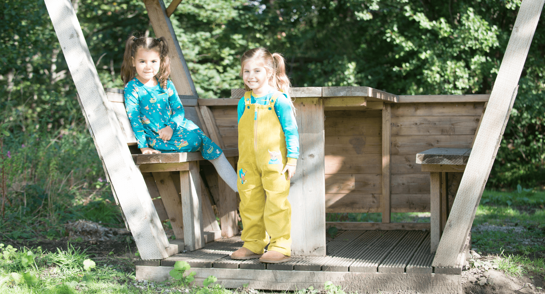 Two girls wearing Ducky Zebra clothes