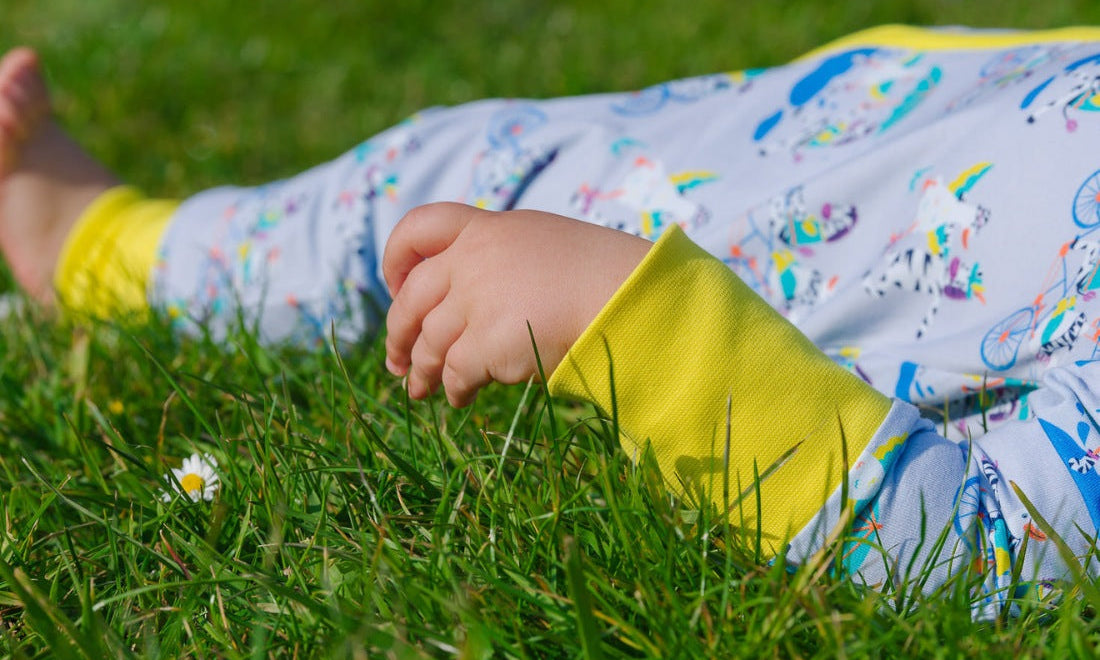 Unisex Baby Sleepsuit with fun ducky zebra print