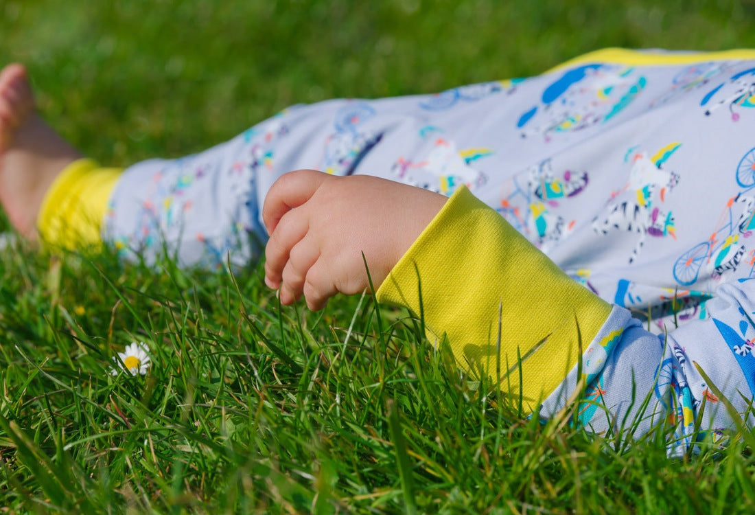 Unisex Baby Sleepsuit with fun ducky zebra print