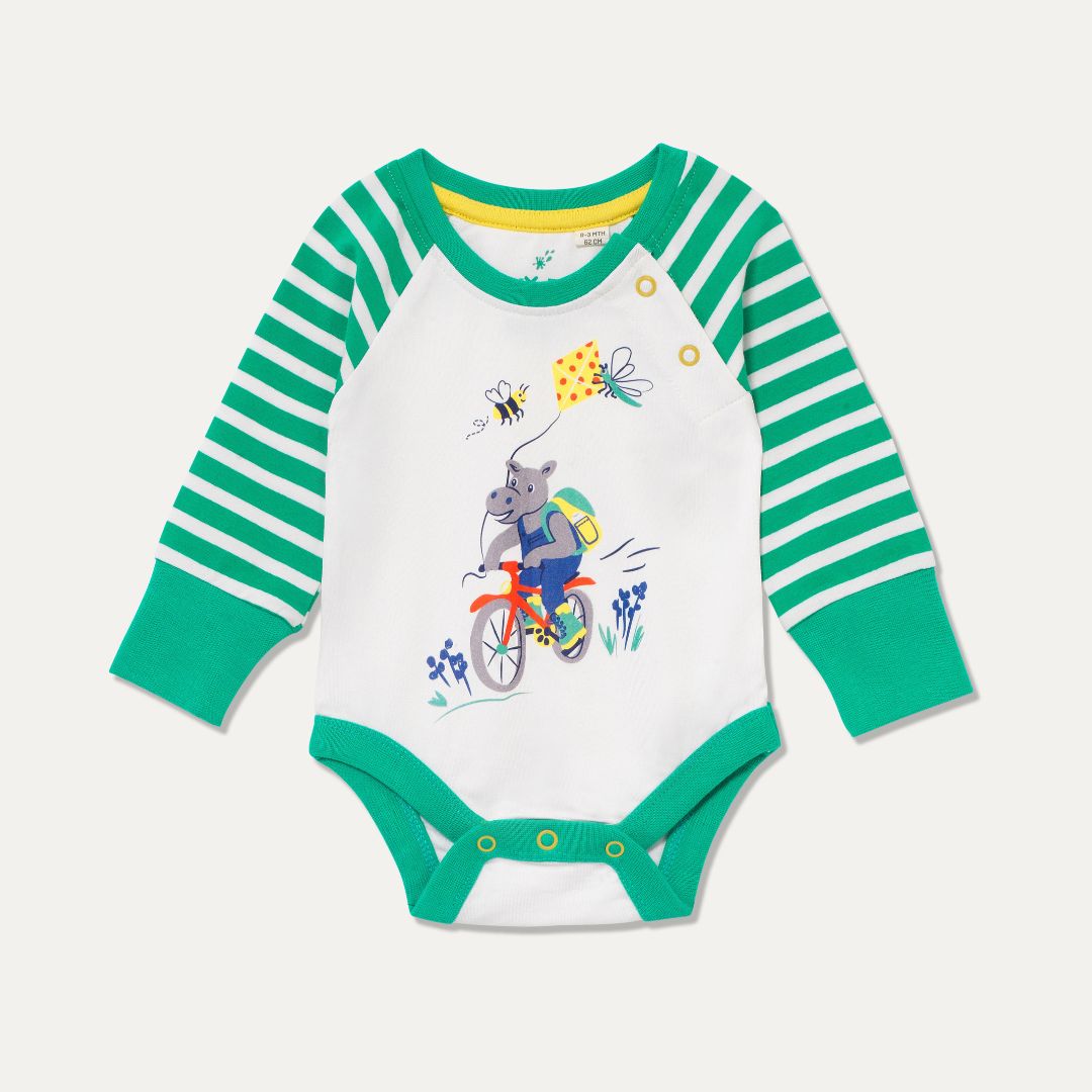 Baby Organic Cotton Bodysuit with a picture of a cycling, kite flying hippo and a bee. The baby bodysuit has a green and white stripe arm, green cuffs and poppers on the neck and crotch.
