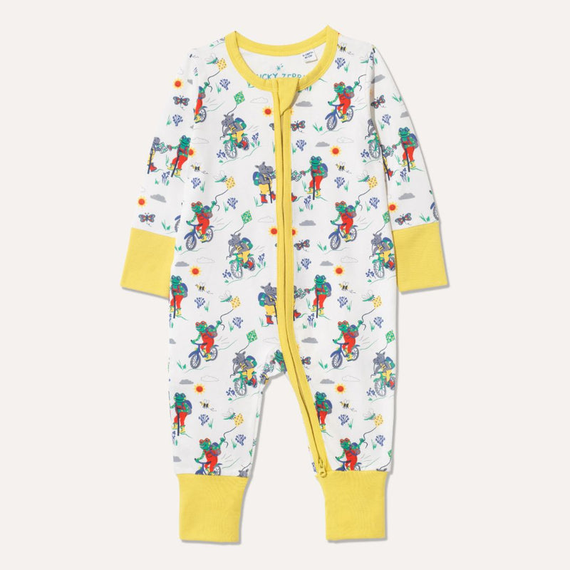Ducky Zebra's Unisex Baby Sleepsuit with a hippo and frog walking and cycling on the Yorkshire Moors. The sleepsuit has a two way yellow zip. 