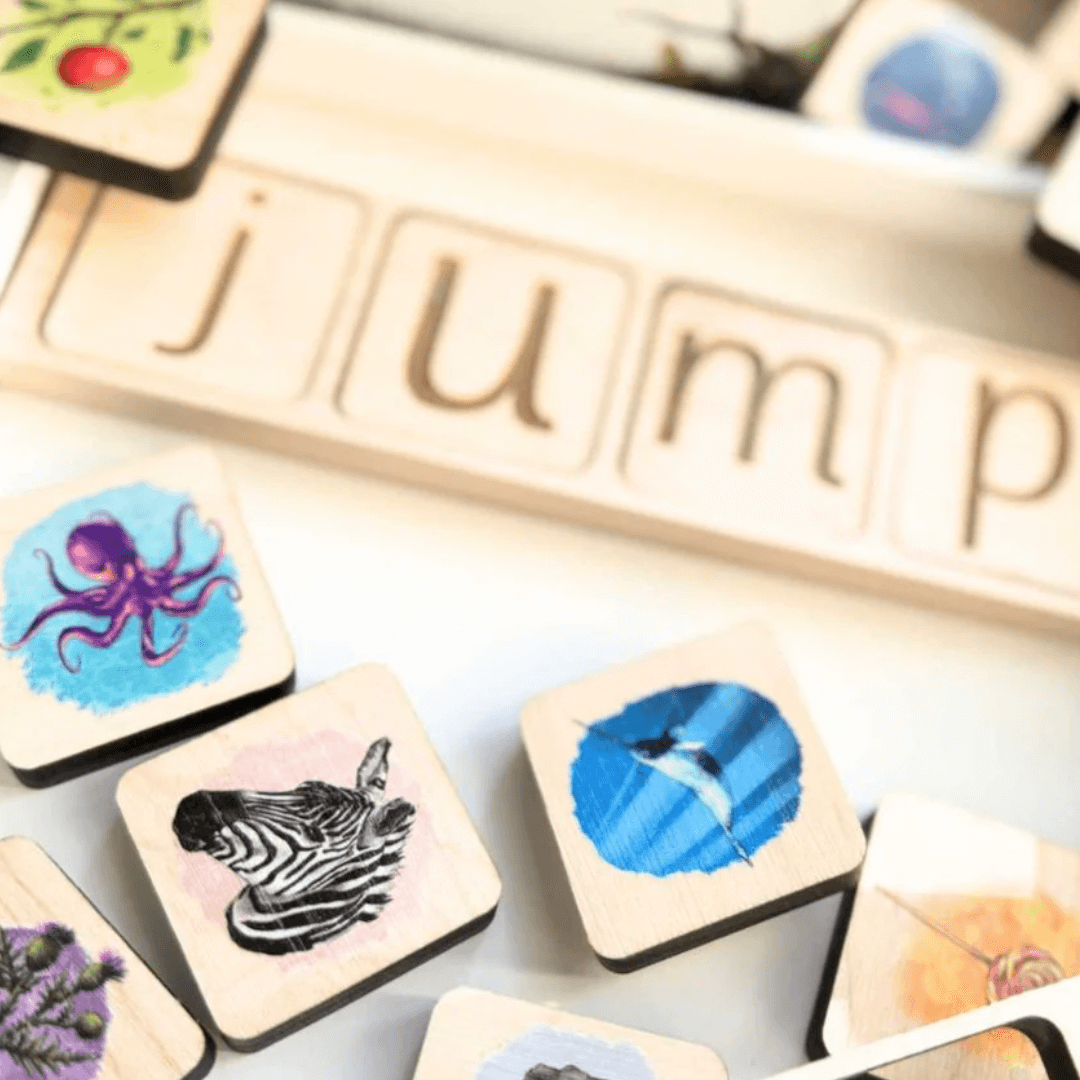 Wooden educational toy with animal illustrations and the word 'jump' on a white background