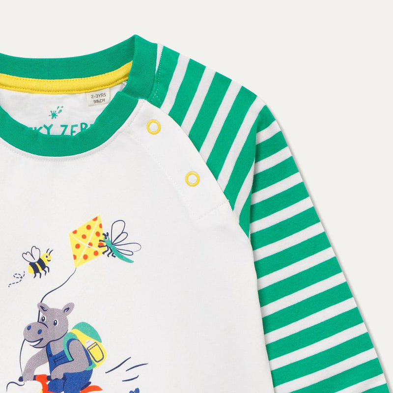 Close up of raglan unisex top with yellow poppers at the neck for easy dressing 