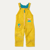 Mustard yellow kids cord dungarees with front zip and two big pockets - each with an appliqué. One is a highland cow, the other a king fisher.