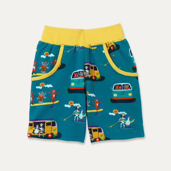 Teal shorts with a campervan and paddleboard print, yellow waistband and two big pockets