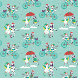Close up image of Ducky Zebra wrapping paper, with a fun print of a Duck and Zebra cycling in the snow as they deliver presents and playing in the snow together.