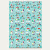 Sheet of recyclable Ducky Zebra wrapping paper, with a fun print of a Duck and Zebra cycling in the snow as they deliver presents and playing in the snow together.