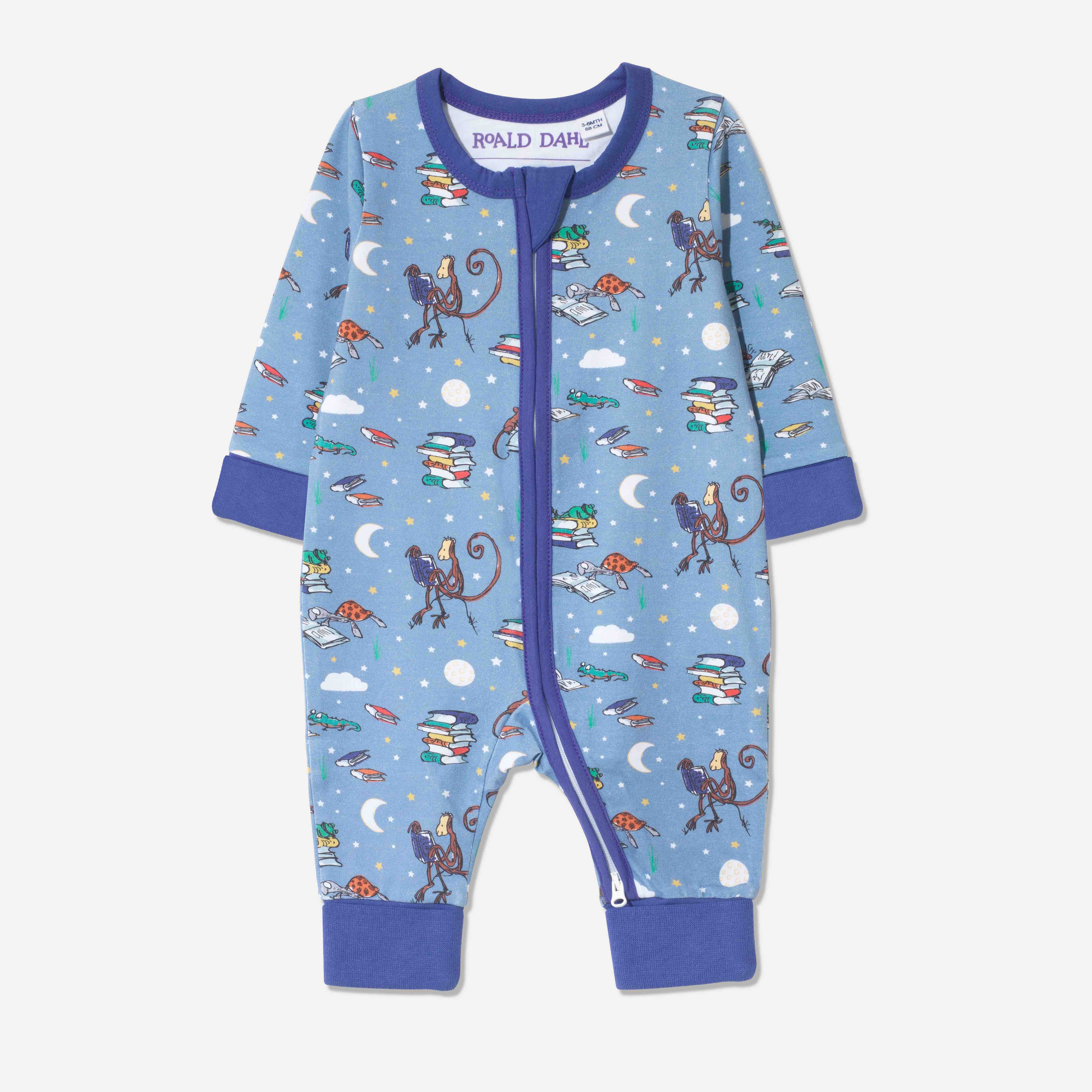 Baby zip Sleepuit with a fun print featuring animals from Roald Dahl stories, including the newt from "Matilda," Alfie the tortoise from "Esio Trot," and Muggle-Wump the monkey from "The Twits". The print is on a forget-me-not background with a purple trim.

