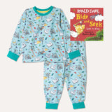 Image of Roald Dahl's 'Hide and Seek' board book alongside a pair of Ducky Zebra x Roald Dahl aqua pyjamas with the animals from the Giraffe and the Pelly and Me leaping out of books