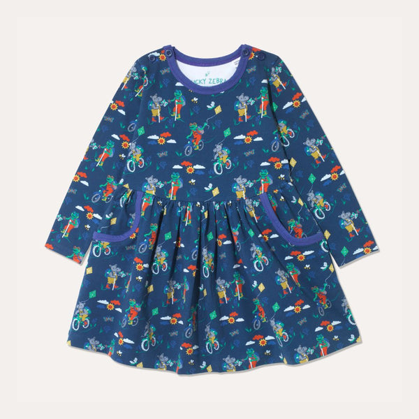 Navy blue skater dress with purple trim and repeat print of a frog and hippo cycling and walking on the Yorkshire Moor