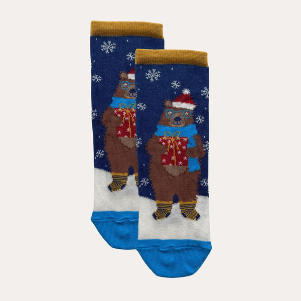 Pair of kids' socks with a smiling bear wearing a Christmas hat