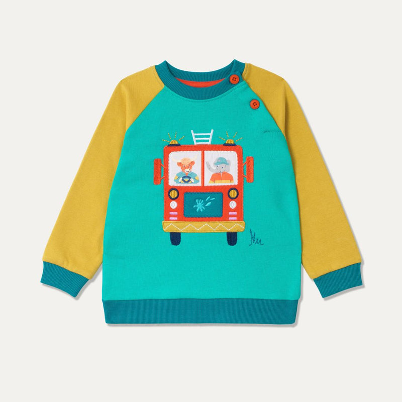 Children's sweatshirt with a highland cow and elephant driving a fire engine. The sweatshirt has a turquoise background and mustard yellow sleeves.