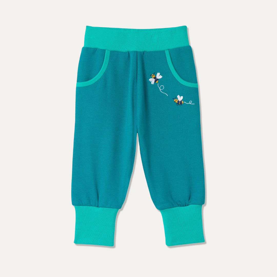 Teal joggers with turquoise waistband, cuffs and pocket trim - with two embroidered bees by the pocket