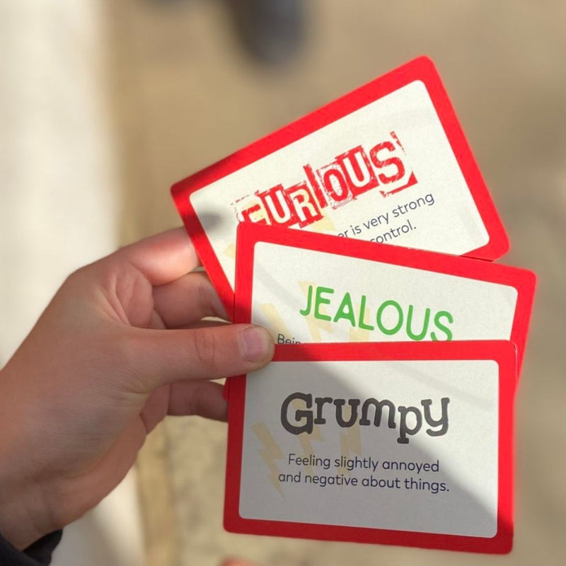 Image of three FEELIT! cards including Grumpy, Jealous and Furious