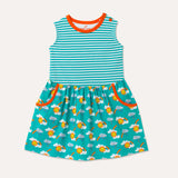 Image of sleeveless kids dress with turquoise stripe top half and rainbow print bottom half, displaying two large pockets with orange trim