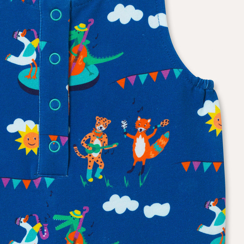 Image of a unisex baby sleeveless romper with blue background and colourful repeat print pattern of a duck, crocodile, cheetah and fox playing at a festival. The image shows four turquoise poppers on the front placket