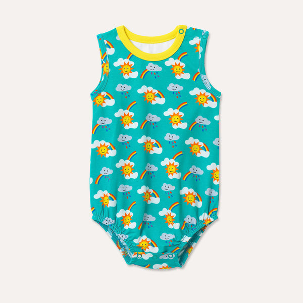 Image of a unisex sleeveless baby bodysuit with a turquoise background and repeat print pattern of rainbows, sun and clouds. The image shows the front of the bodysuit with a yellow neck trim and two turquoise poppers on the shoulder