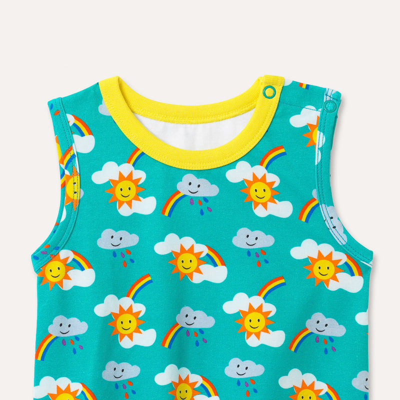 Image of a unisex sleeveless baby bodysuit with a turquoise background and repeat print pattern of rainbows, sun and clouds. The image shows the top half of the bodysuit with a yellow neck trim and two turquoise poppers on the shoulder