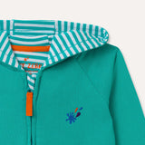 Image of turquoise hoody with flame orange zip pull, embroidered splash motif on the right hand side of the chest and turquoise stripe inner lining